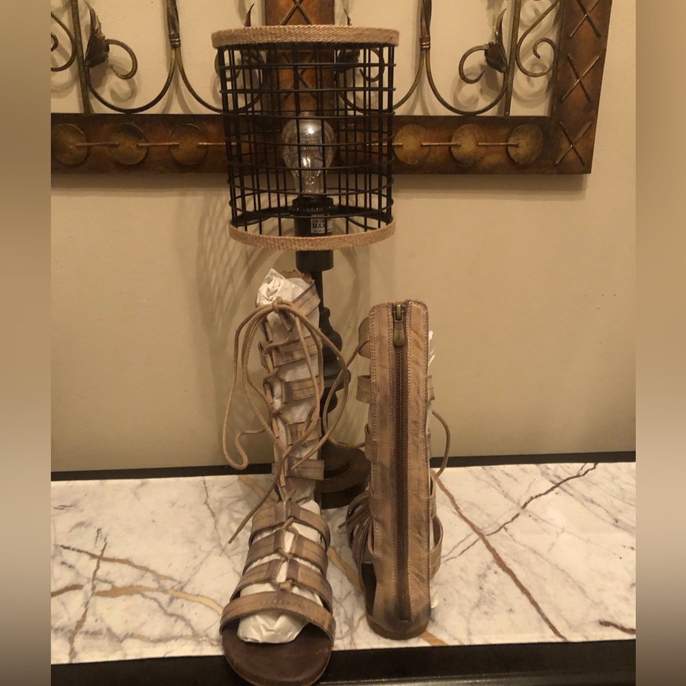 Flat Gladiator sandals; size 7.5 wide ; lace up front with back zipper